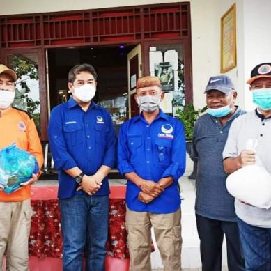 NASDEM BERBAGI KASIH DENGAN KORBAN BANJIR DENGILO PAGUAT.