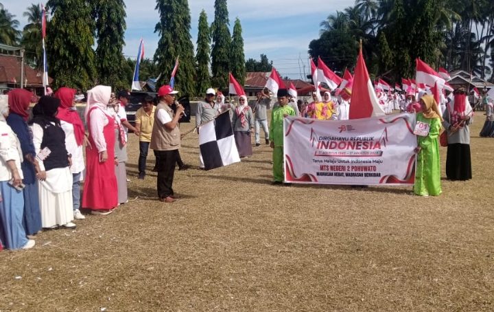 Diikuti Ratusan Siswa TK, SD, SMP Dan SMA Se Kecamatan Lemito, Ikut Pawai  Dan Di Lepas Camat Herman Harun