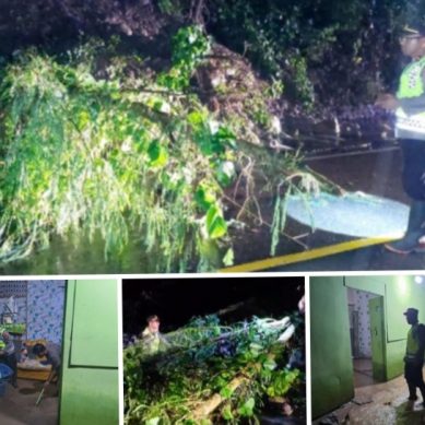 Polsek Taluditi Bergerak Cepat Atasi Longsor Di jalan Trans Taluditi.