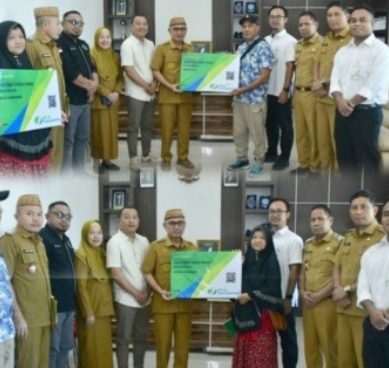 Bupati Saipul Serahkan Kepesertaan BPJS Ketenagakerjaan CSR PT IGL dan PT BTL